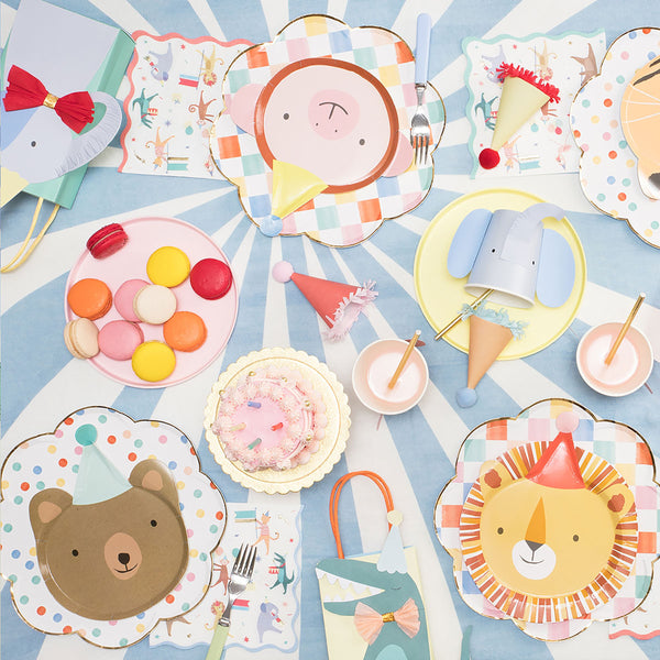These kids party plates feature a bear plate, monkey plates, tiger plates and lion plates with pom poms. Image2