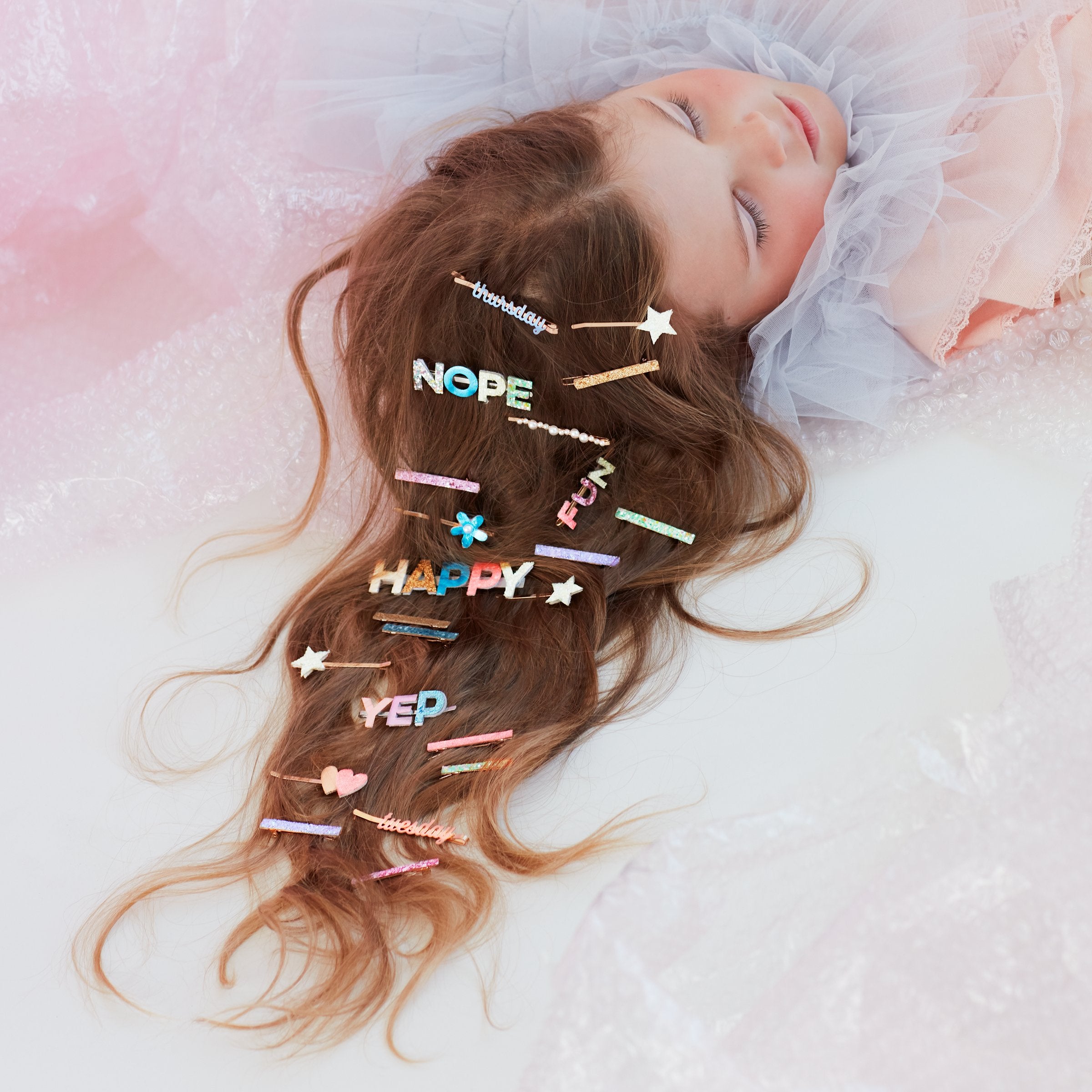 Get great party hair with our glitter hair accessories.
