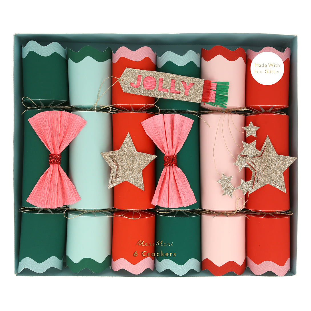 Our Christmas table set includes colorful fun items including crackers, party hats, coloring placemats and a Christmas garland.