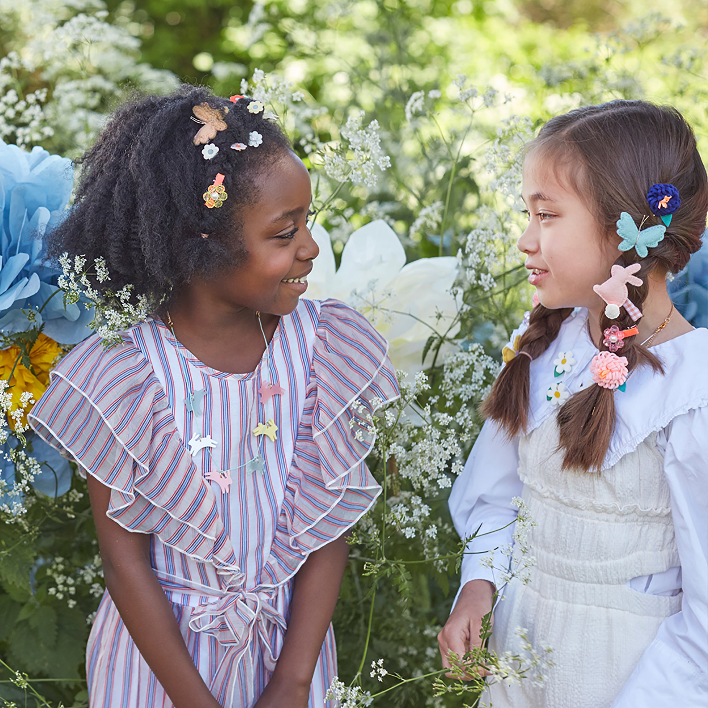 Our hair accessories for kids for Easter are the sweetest little bunnies hair clips, with pompoms and gingham ribbons.