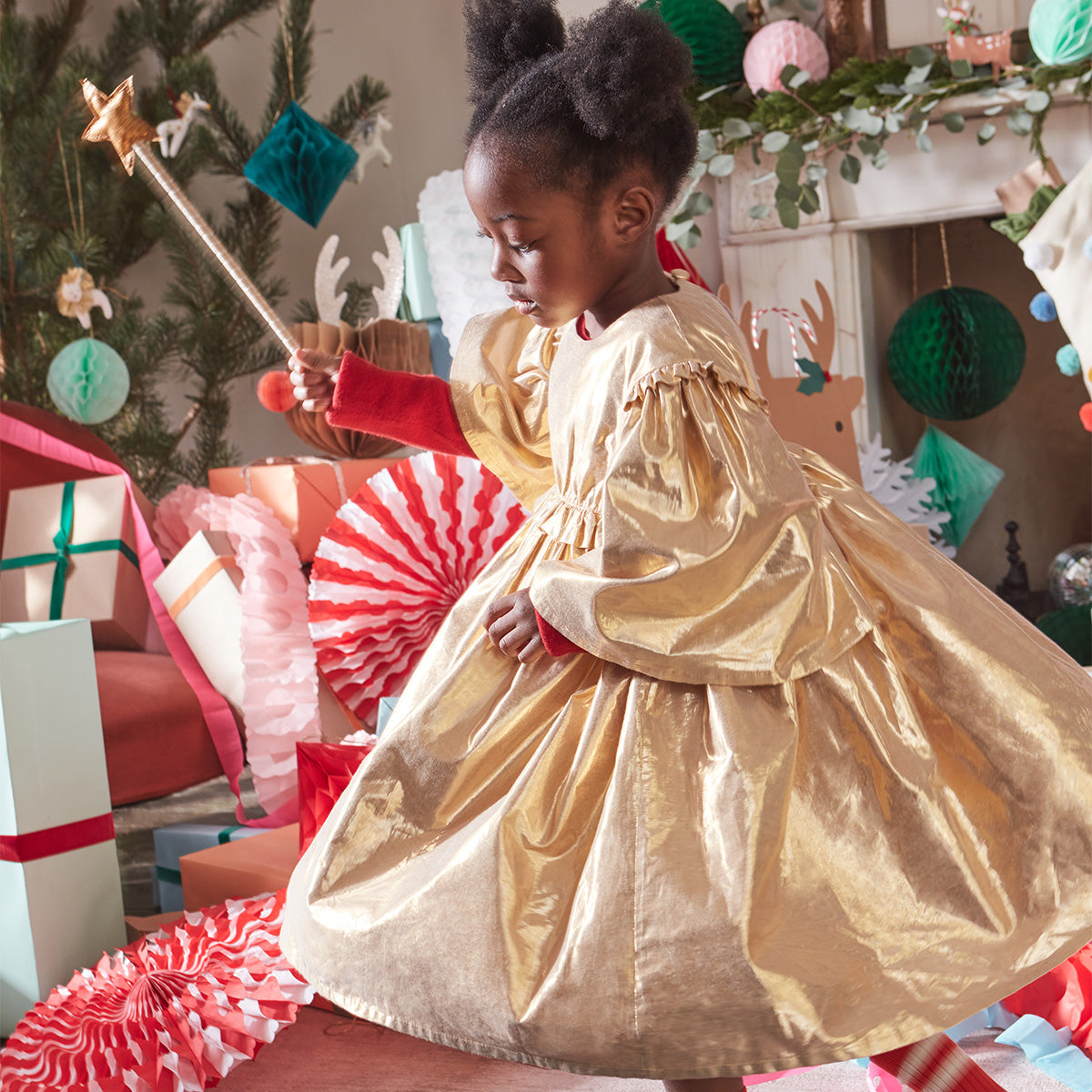 This beautiful gold lamé Christmas dress for girls is really angelic.