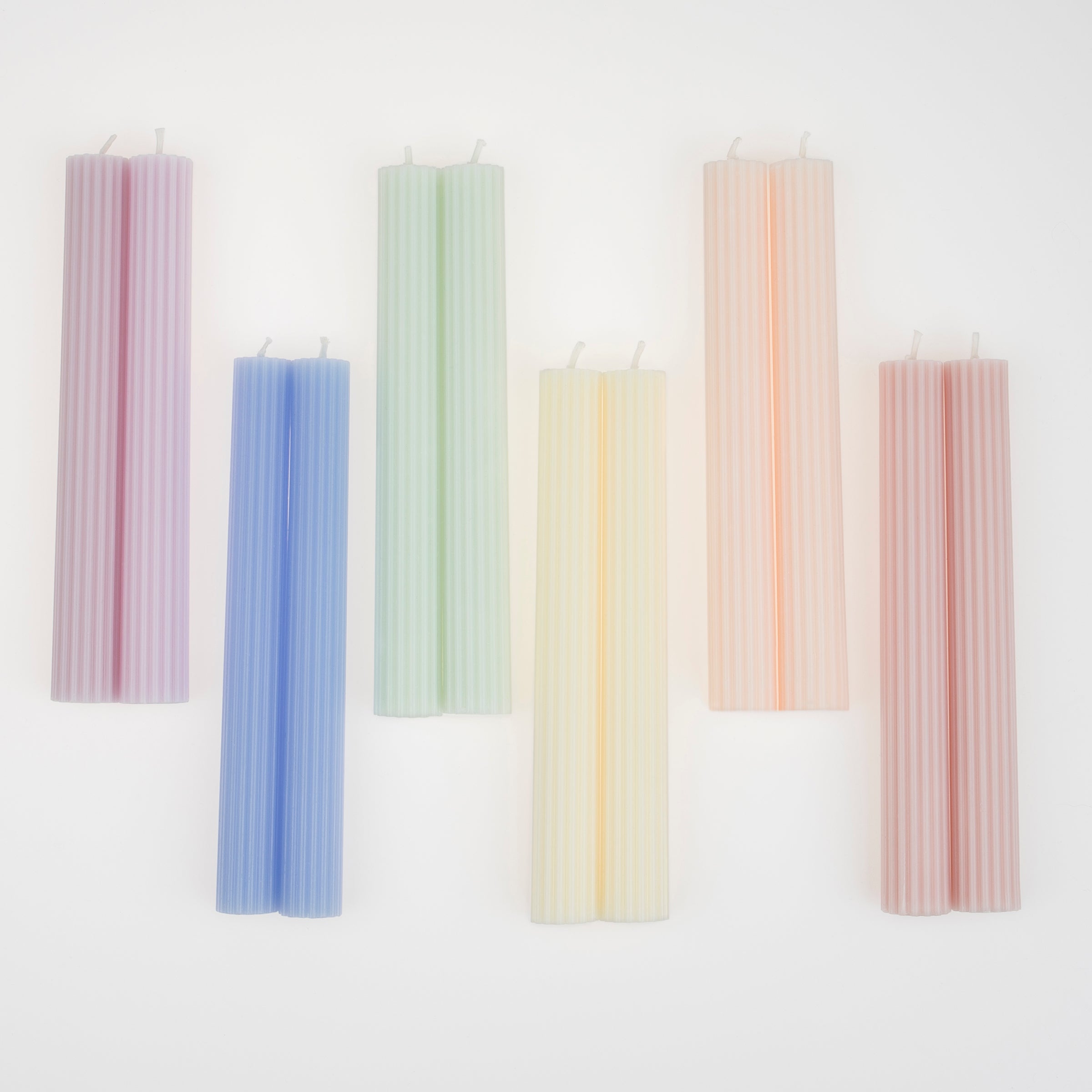 Our pastel decorative candles are perfect as birthday party table decorations or baby shower table decorations.
