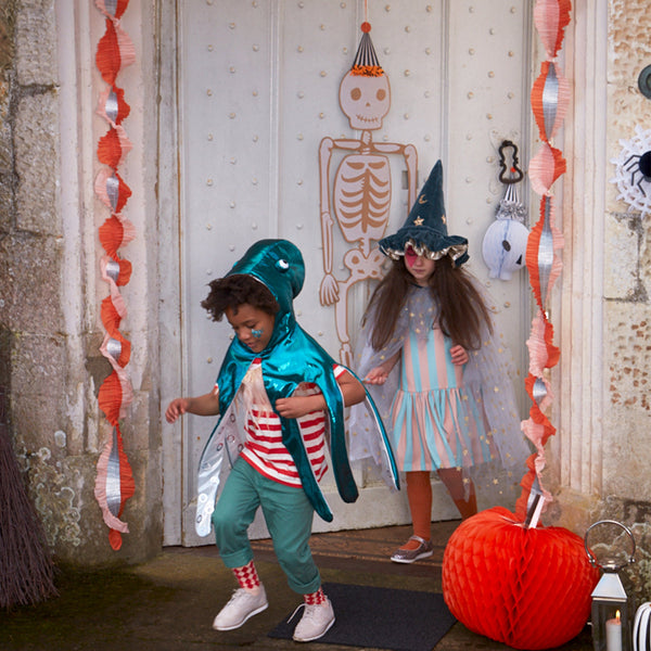 Thrill your guests at your Halloween party for kids with our jointed skeleton decorations,  perfect to hang in the porch or on the wall. Image3