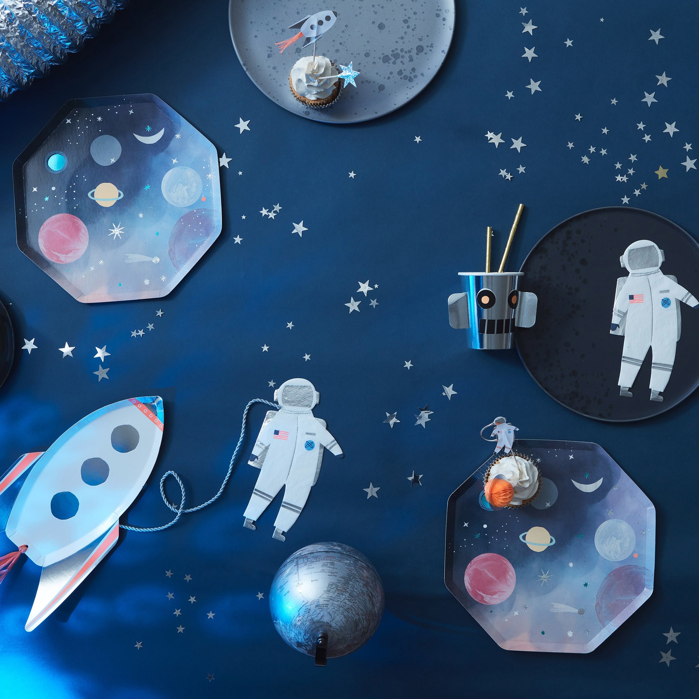 Our paper plates feature brightly colored planets and stars for an out-of-this world astronaut party.