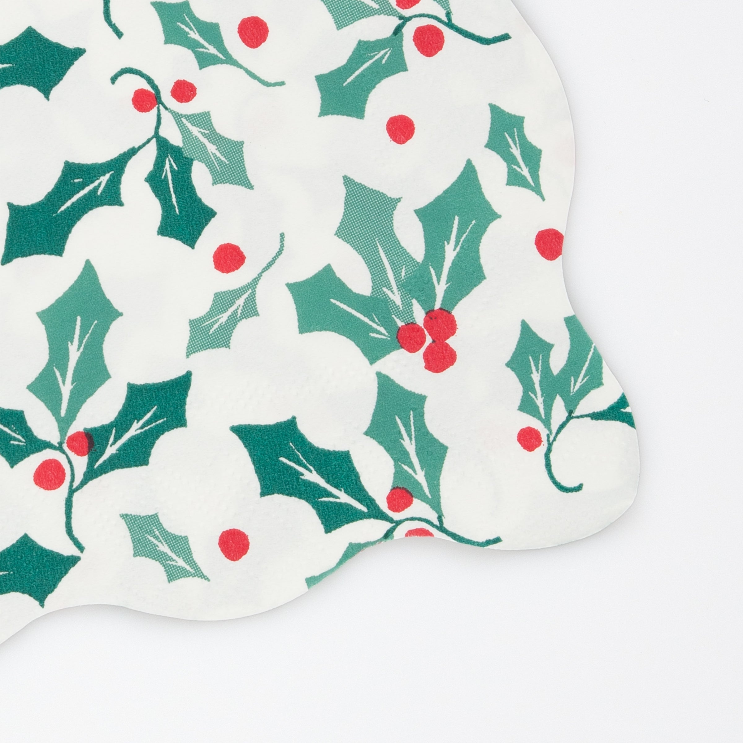Our scalloped napkins, with a holly design, are the perfect party napkins to add to your Christmas party supplies.