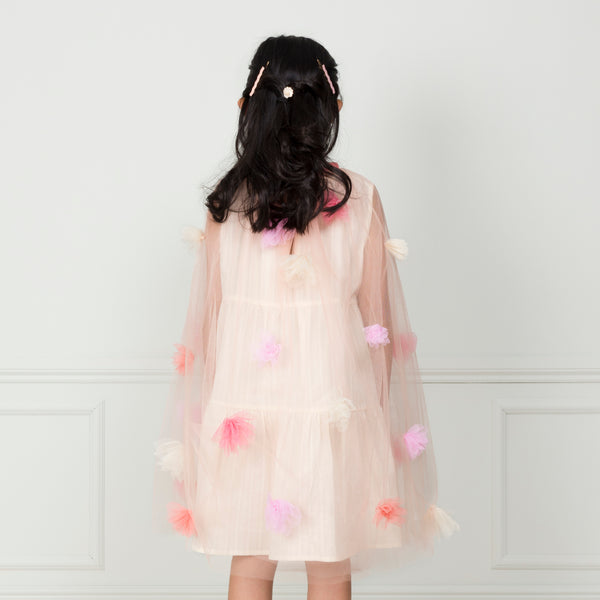 Our kids cape is crafted from tulle with tulle flower embellishments. Image4