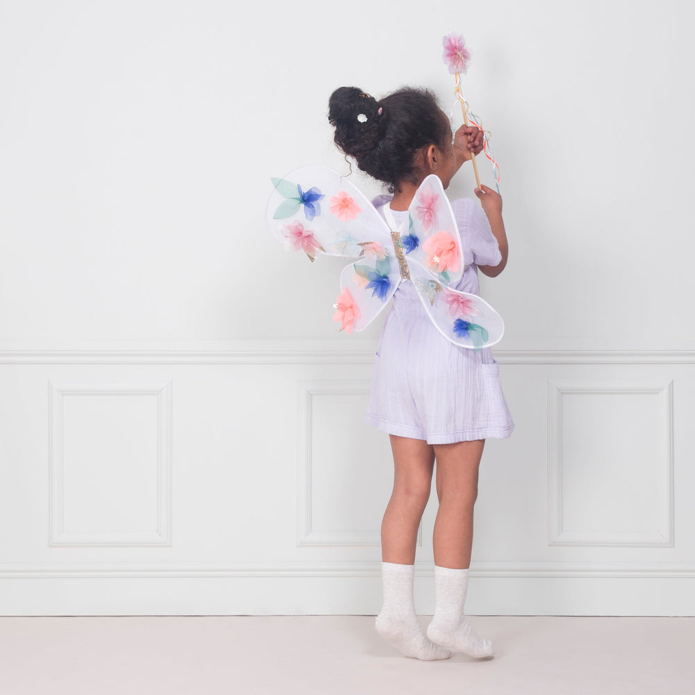 Child wearing organza flower wings