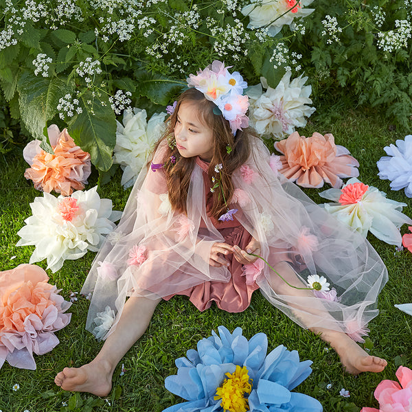 Our kids cape is crafted from tulle with tulle flower embellishments. Image6