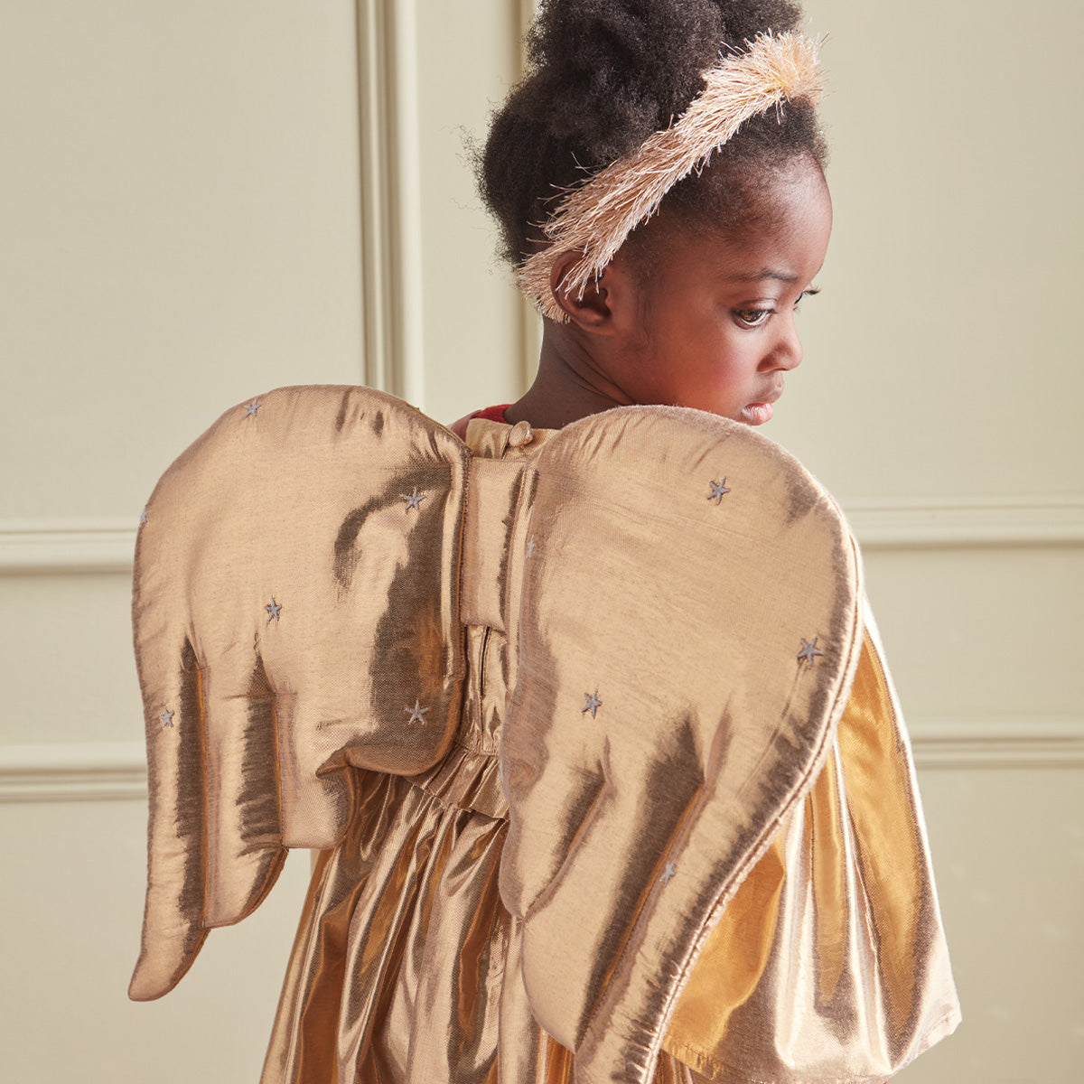 Our gold angel wings and gold angel handband are perfect kids' Christmas costumes.