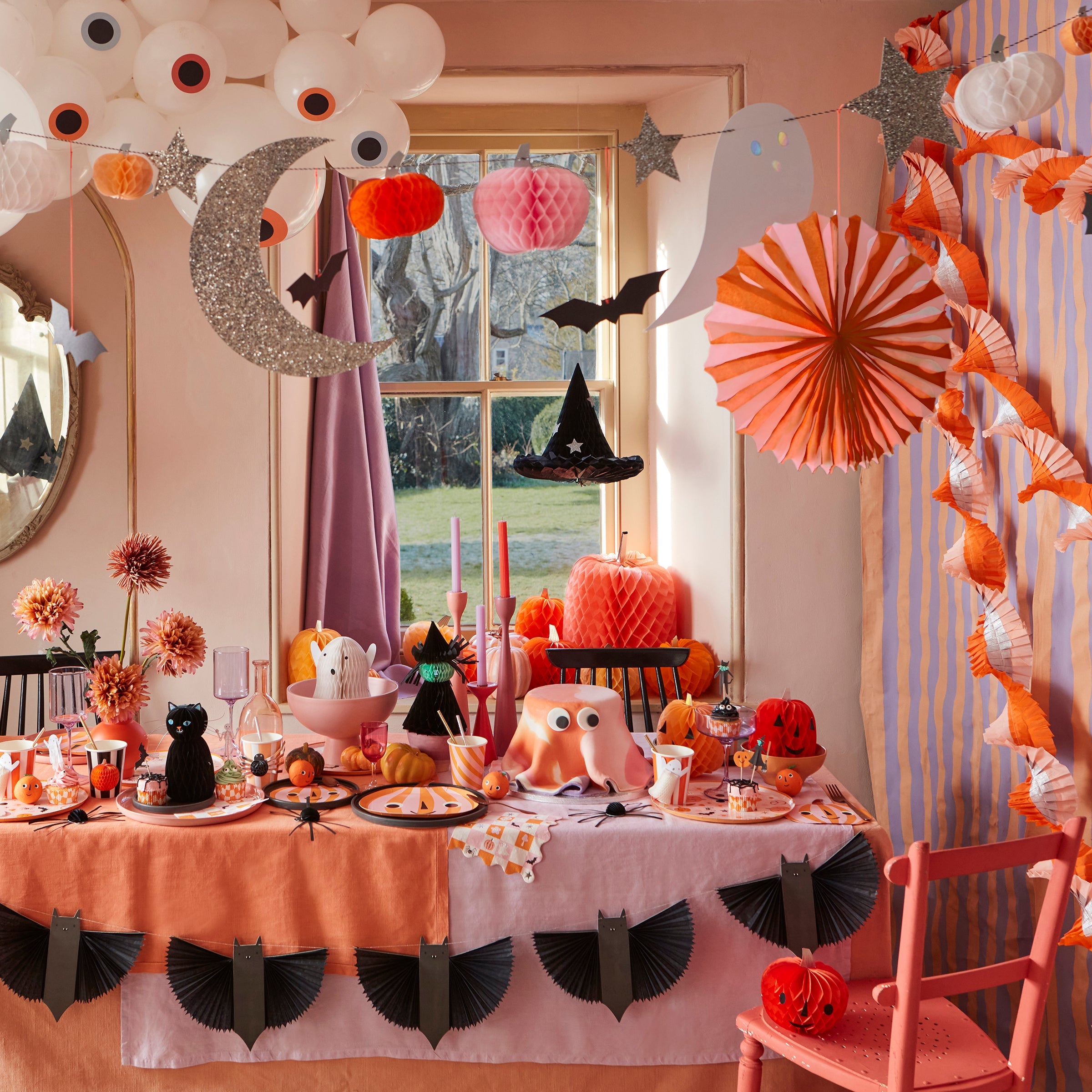 Our pastel garland is the perfect paper garland for a kids Halloween party.