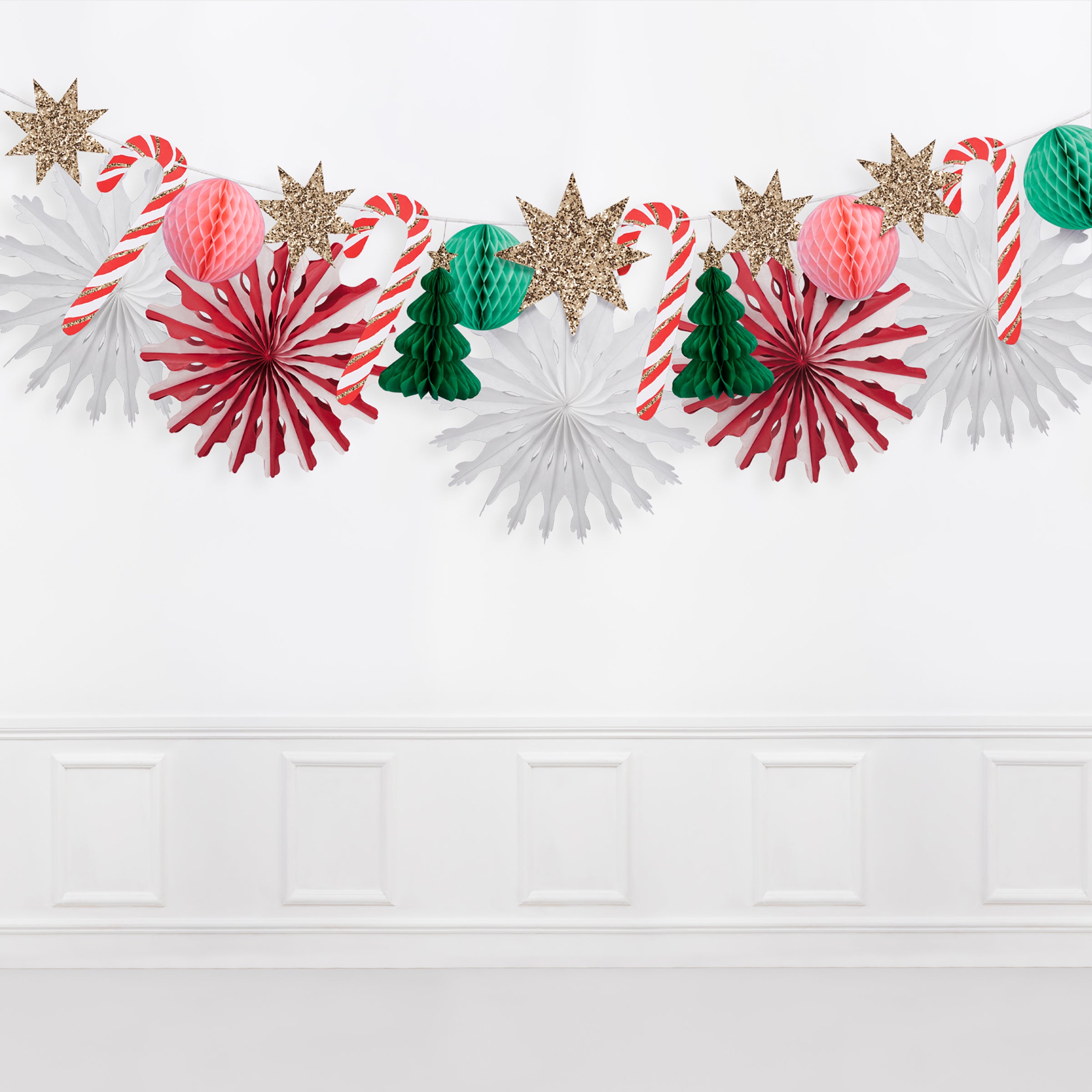 Our Christmas paper garland has 3D honeycomb decorations, stars and Christmas trees.