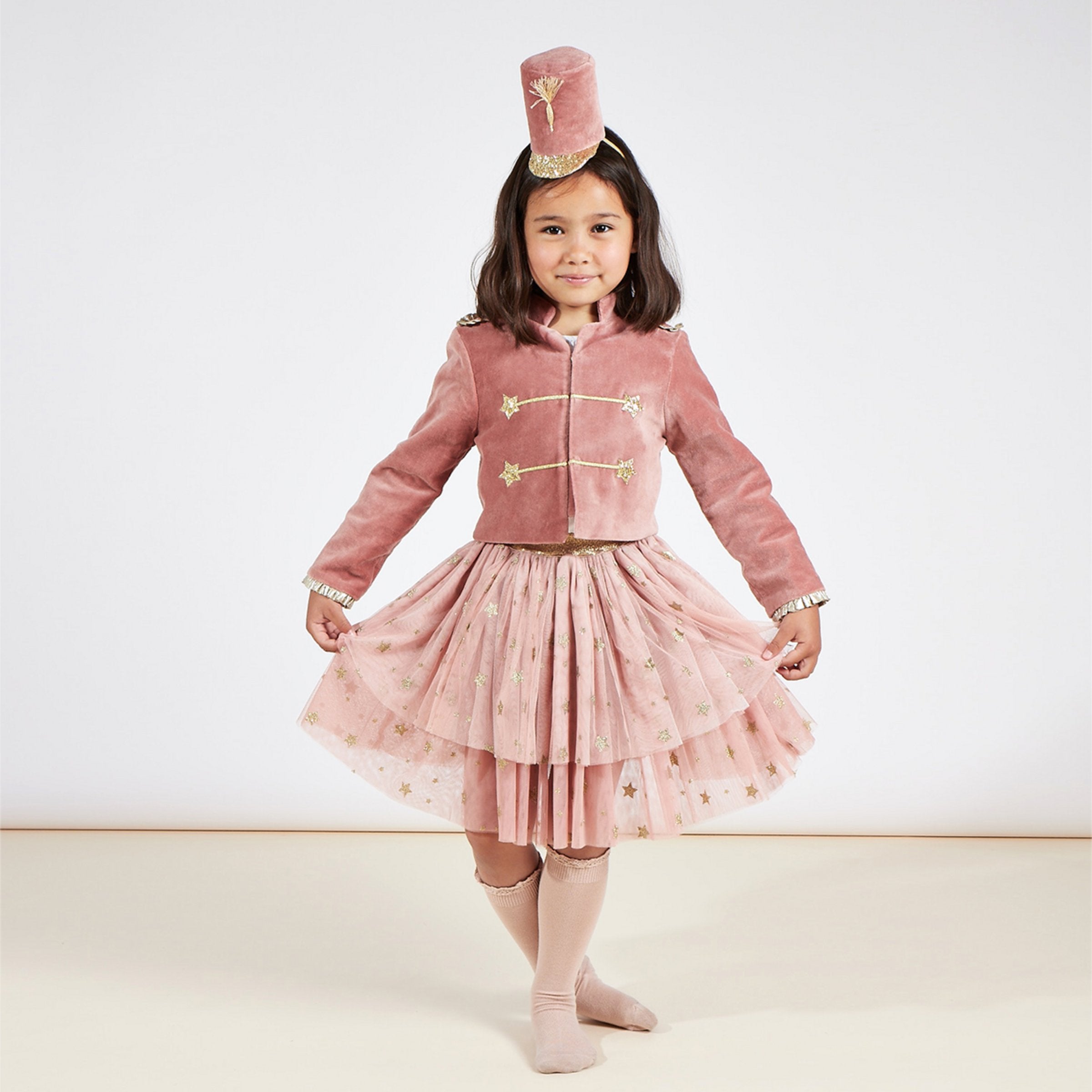 This girls' Christmas costume is made from velvet, tulle and gold lamé.