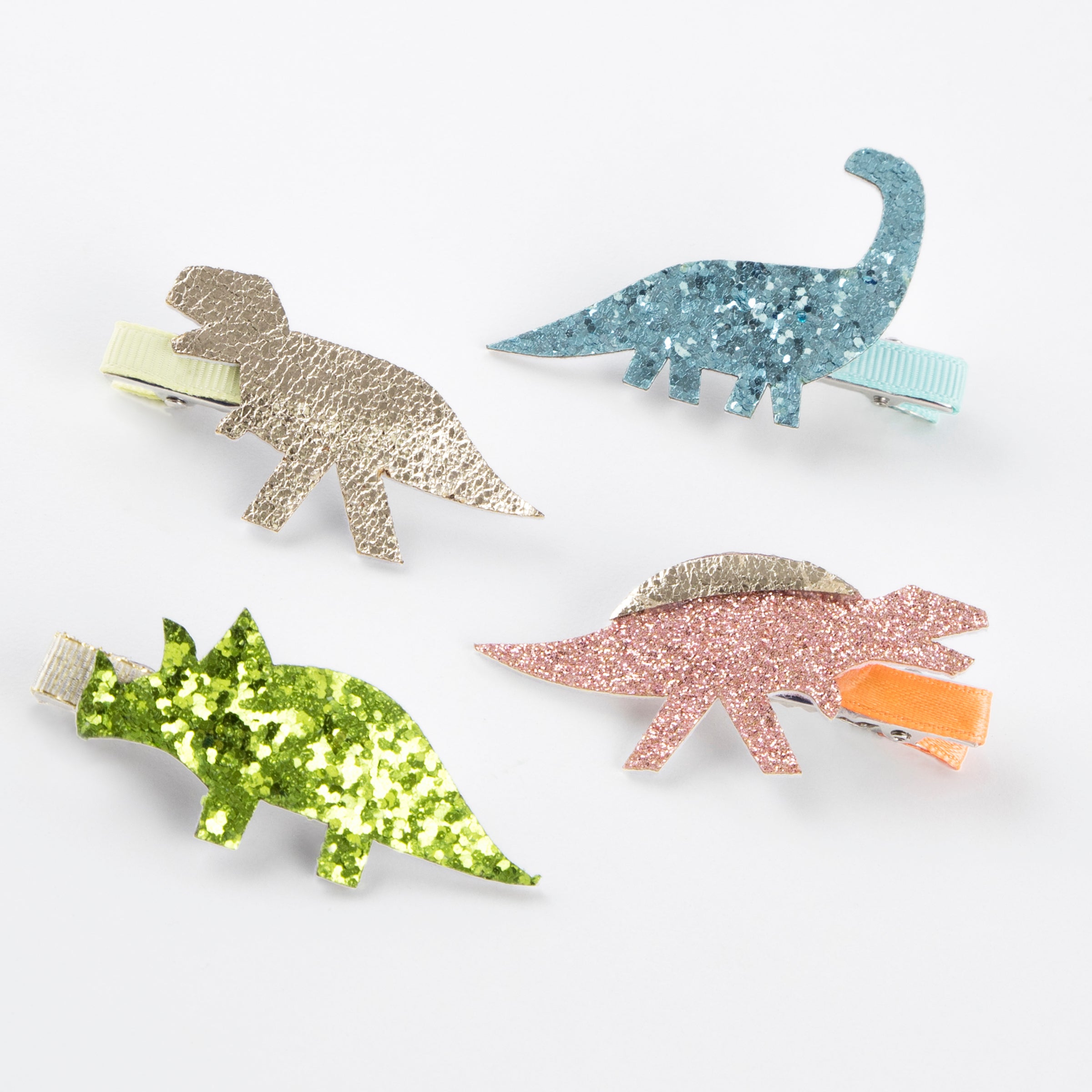 Our glitter hair clips are perfect to create dinosaur hair.