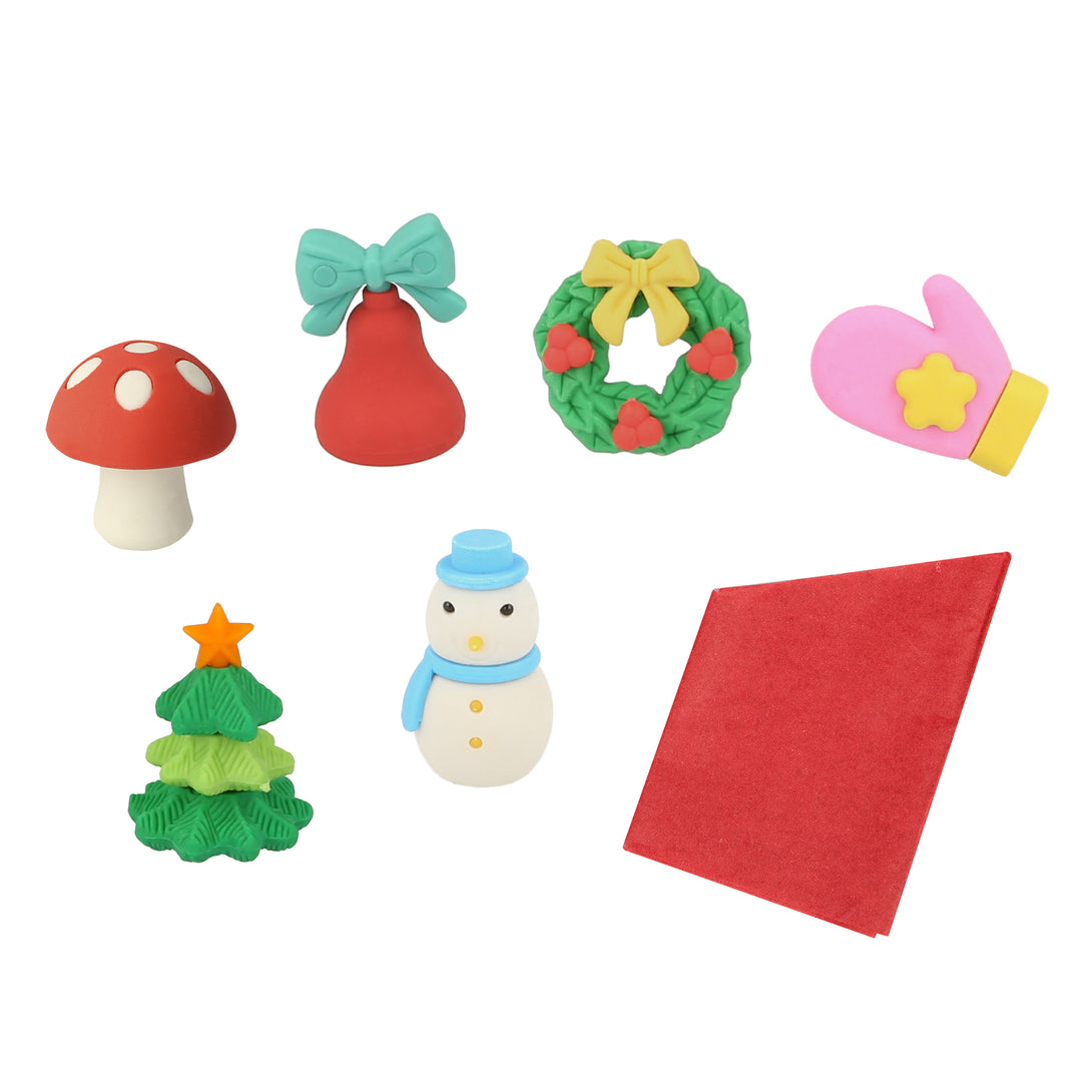 Our Christmas table set includes colorful fun items including crackers, party hats, coloring placemats and a Christmas garland.